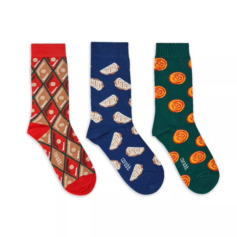 Khoncha collection of 3 pairs of socks dedicated to Shakerbur, Baklava, and Gogal, symbols of Azerbaijani national cuisine and Novruz holiday.